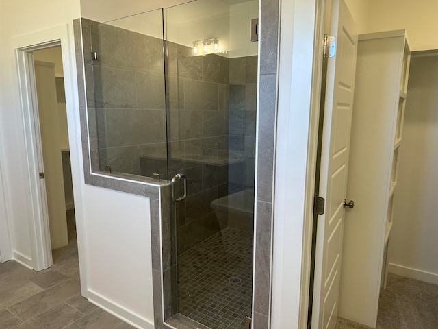 full bathroom with a shower stall