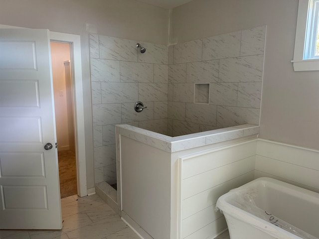 bathroom featuring separate shower and tub