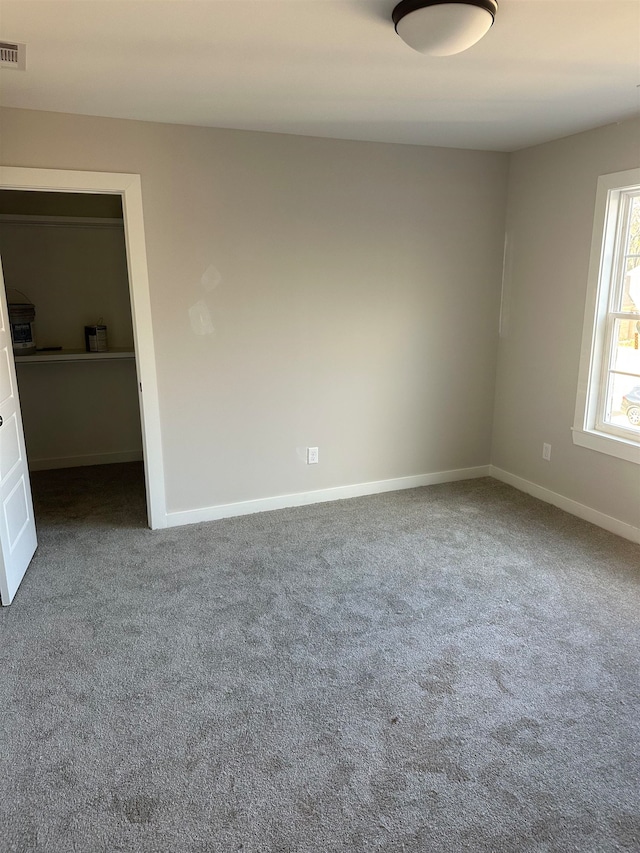 view of carpeted spare room