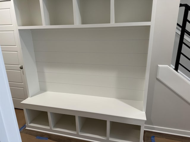 mudroom with dark wood-type flooring