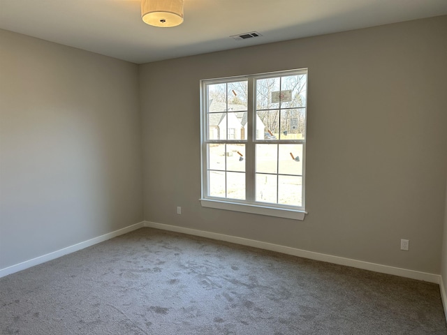 empty room with carpet floors