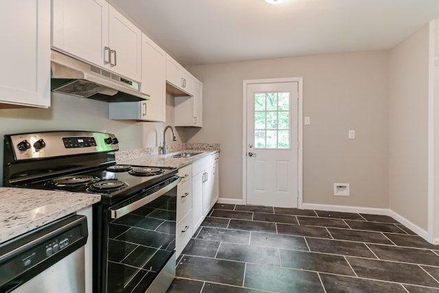 kitchen featuring under cabinet range hood, stainless steel appliances, white cabinets, and a sink