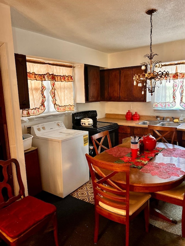 kitchen featuring dark brown cabinets, an inviting chandelier, a textured ceiling, black / electric stove, and a sink