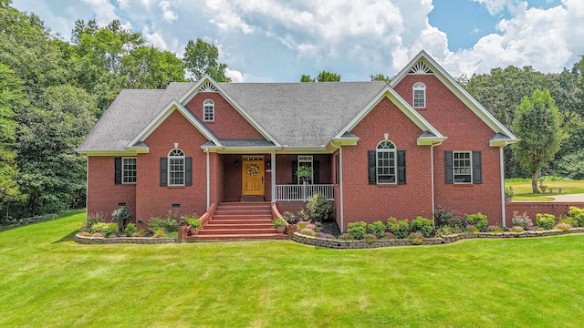 view of front of property with a porch and a front yard