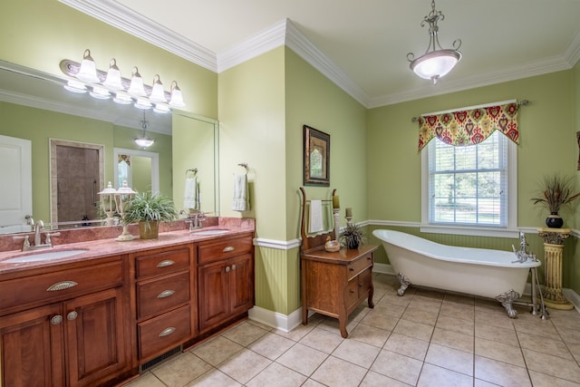 bathroom featuring tile patterned floors, vanity, separate shower and tub, and crown molding