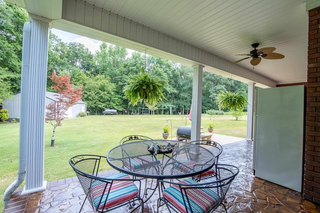 view of patio featuring ceiling fan