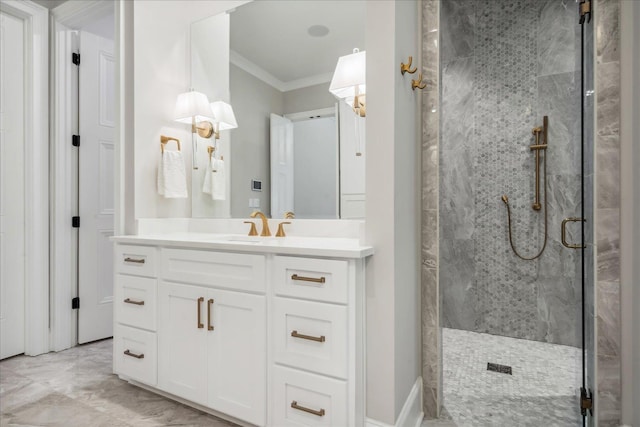 bathroom featuring vanity, crown molding, and an enclosed shower