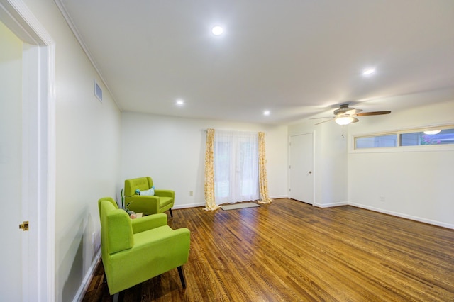 sitting room featuring recessed lighting, wood finished floors, visible vents, and baseboards