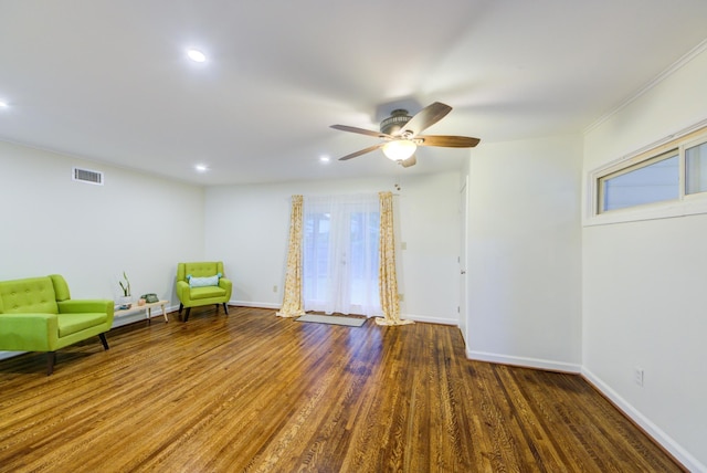 unfurnished room featuring recessed lighting, wood finished floors, visible vents, and baseboards