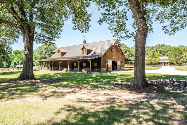 exterior space featuring a lawn