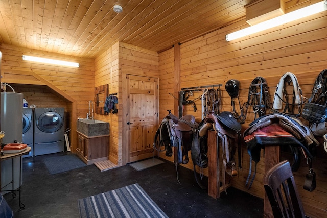 view of horse barn with washer and clothes dryer