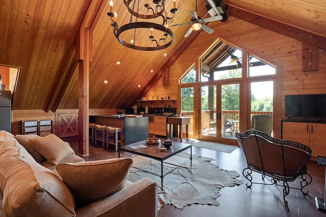 living room with wood ceiling, beamed ceiling, ceiling fan, and hardwood / wood-style floors