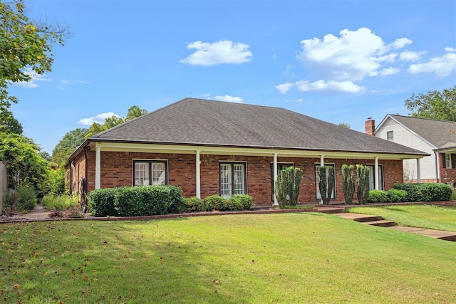 view of front of house with a front lawn