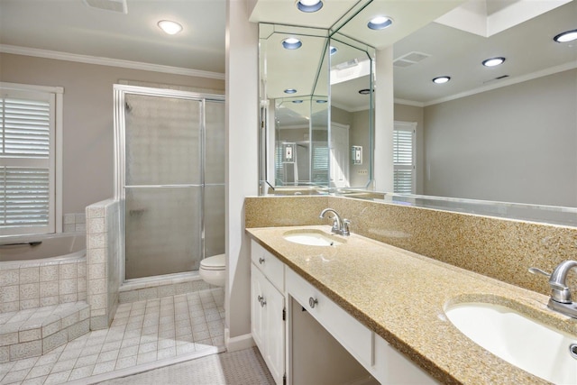 full bathroom featuring plus walk in shower, vanity, toilet, crown molding, and tile patterned floors