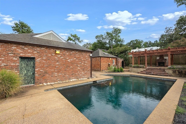 view of pool featuring a pergola and a patio