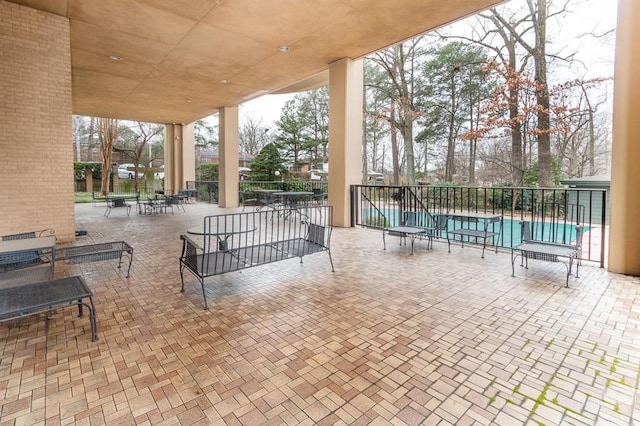 view of patio with a community pool