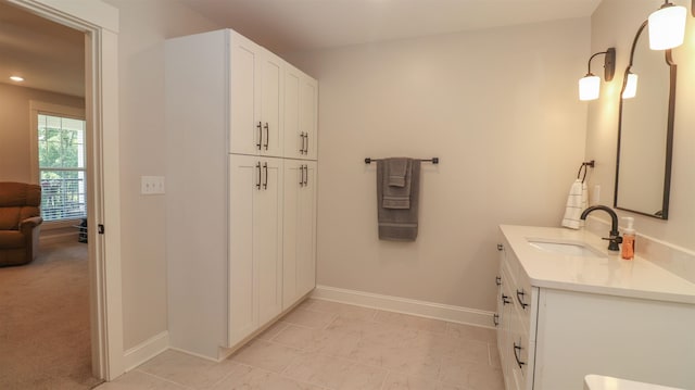 bathroom featuring vanity and tile patterned flooring