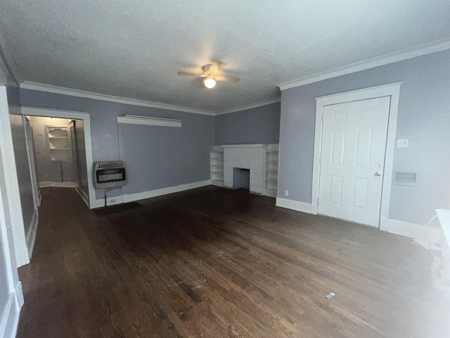 unfurnished living room featuring crown molding, dark wood-style flooring, a fireplace, and heating unit