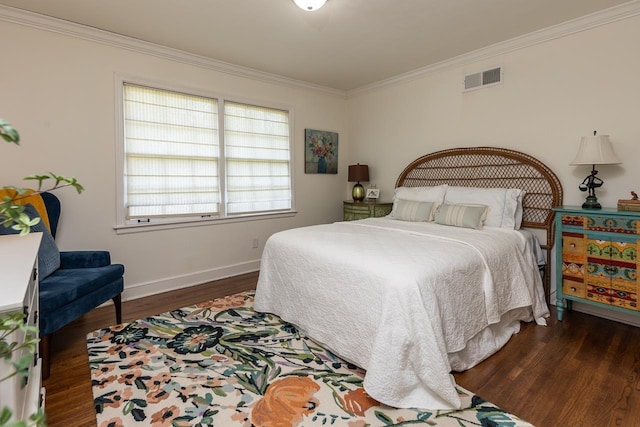 bedroom with crown molding and dark wood-type flooring