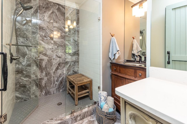 bathroom featuring vanity, ornamental molding, and walk in shower