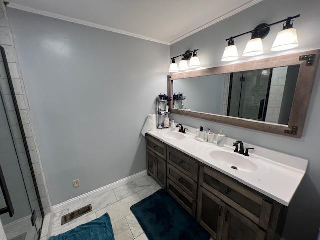 bathroom featuring crown molding, vanity, and walk in shower