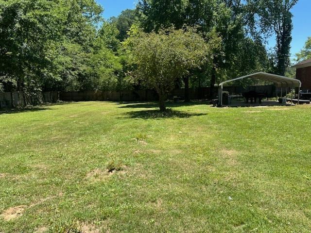 view of yard featuring a carport