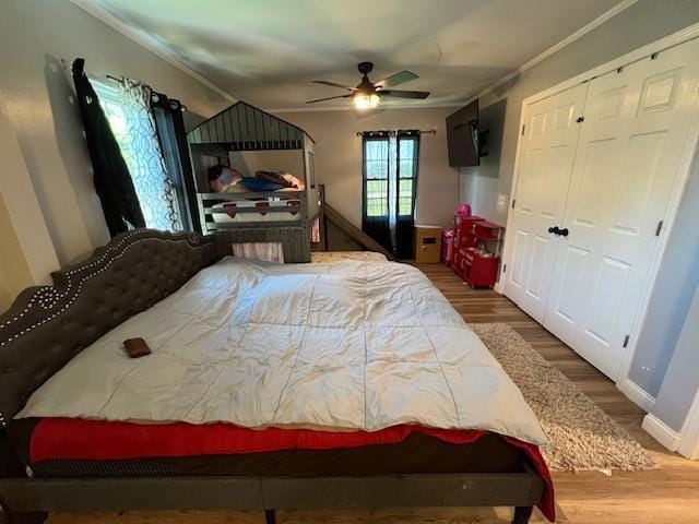 bedroom featuring ceiling fan and hardwood / wood-style flooring