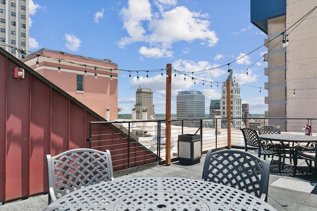 view of patio / terrace with a balcony