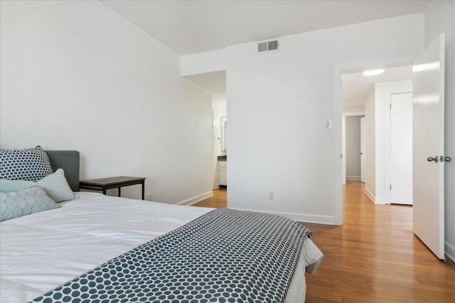 bedroom featuring light hardwood / wood-style flooring