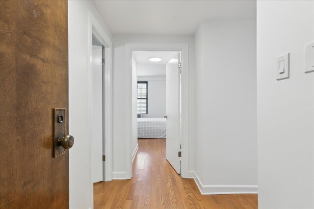 hallway featuring light hardwood / wood-style floors