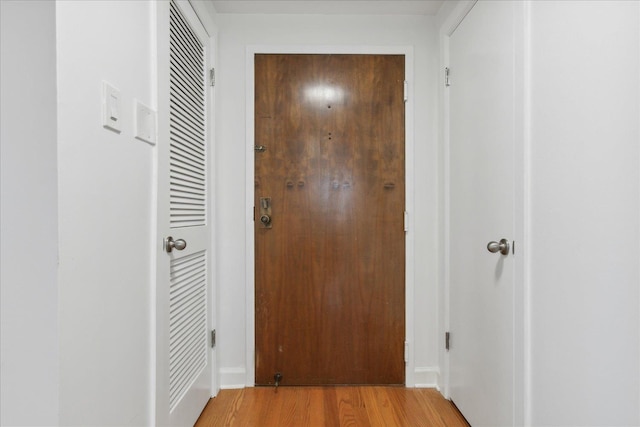 hall featuring hardwood / wood-style floors