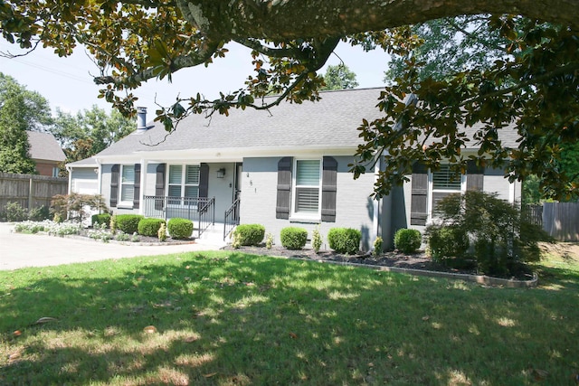 view of front of house with a porch and a front lawn