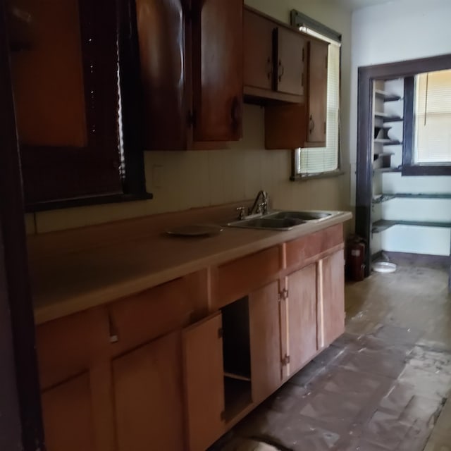 kitchen featuring sink and backsplash