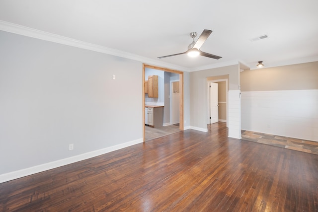 unfurnished room with crown molding, dark hardwood / wood-style floors, and ceiling fan