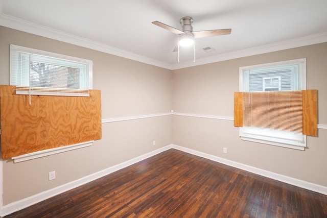 spare room featuring wood-type flooring and ornamental molding