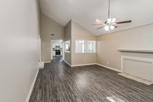 unfurnished living room with vaulted ceiling, dark wood-type flooring, and ceiling fan