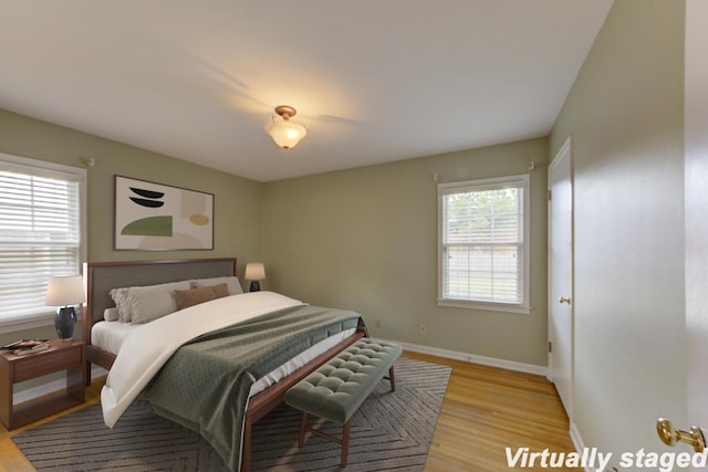 bedroom featuring light wood-type flooring