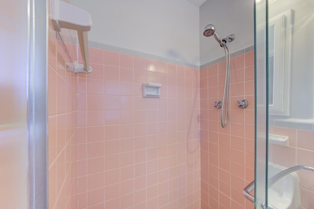 bathroom featuring walk in shower