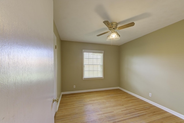 unfurnished room with ceiling fan and light hardwood / wood-style flooring