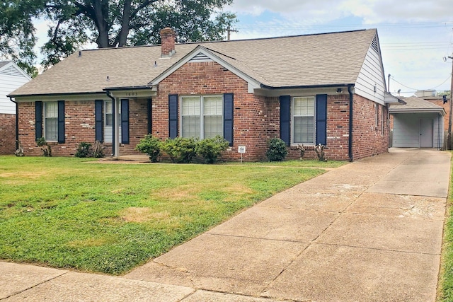 view of front of house featuring a garage and a front yard