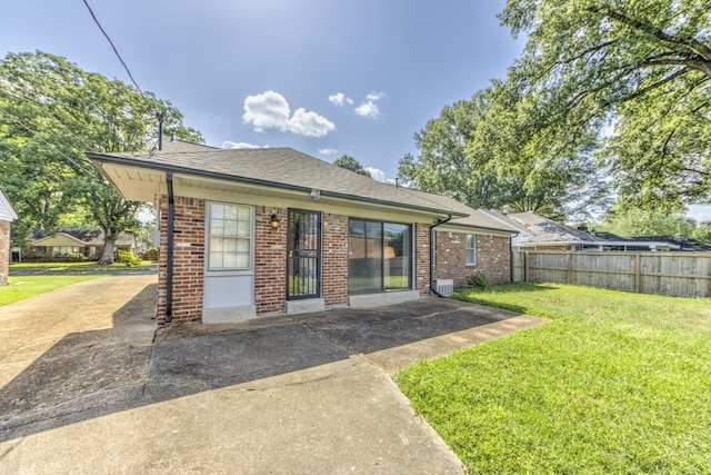 exterior space featuring a front yard