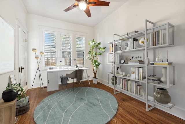 home office with dark hardwood / wood-style floors and ceiling fan