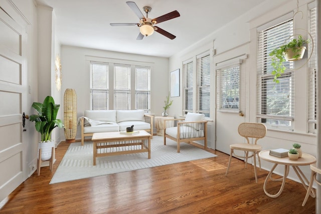 sunroom / solarium with ceiling fan