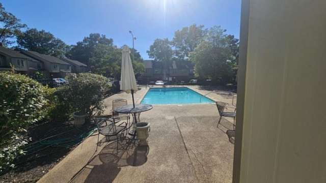 view of pool with a patio