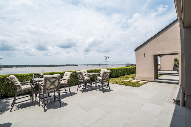 view of patio / terrace with a water view