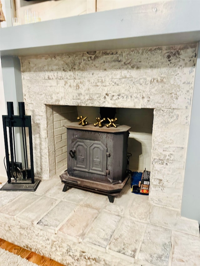 interior details featuring a wood stove