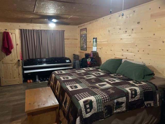 bedroom with wood-type flooring