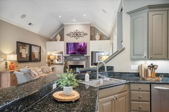 kitchen with gray cabinetry, sink, stainless steel dishwasher, lofted ceiling, and ornamental molding