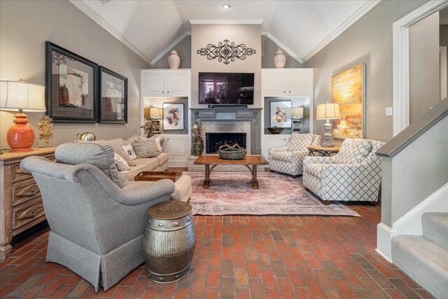 living room with high vaulted ceiling and ornamental molding