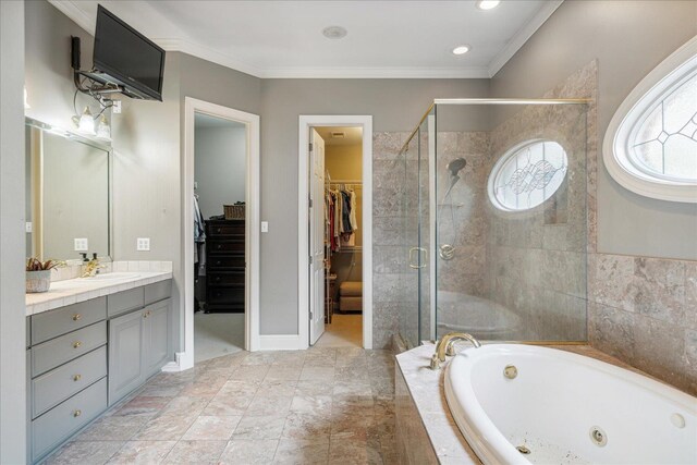 bathroom with ornamental molding, vanity, tile patterned flooring, and shower with separate bathtub